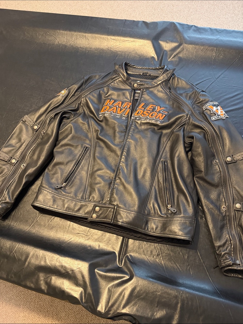 Harley-Davidson Black Leather Jacket with Orange Logo Chest and Sleeve Patches